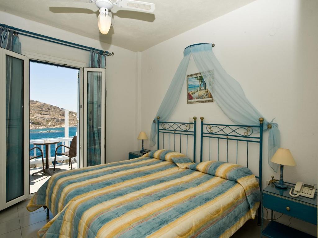 Vana Holidays Ornos  Room photo