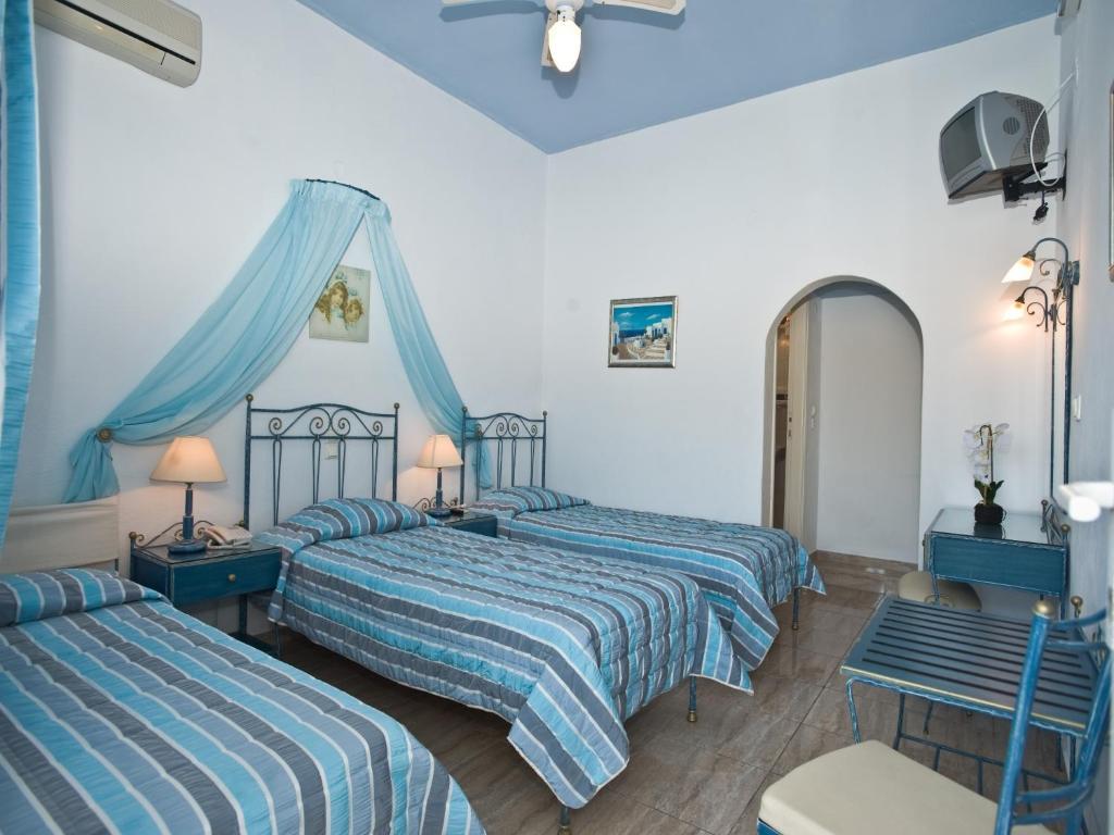 Vana Holidays Ornos  Room photo