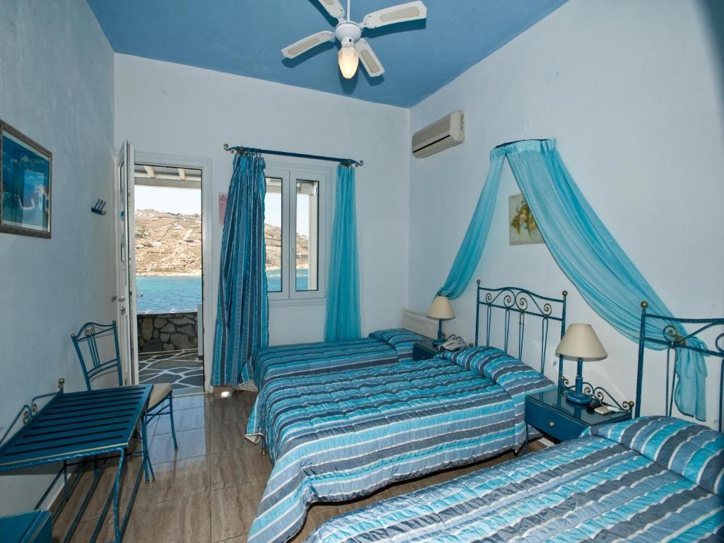 Vana Holidays Ornos  Room photo